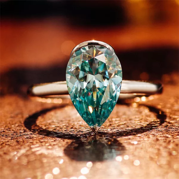 Stunning Pear-Shaped Blue-Green Moissanite Ring