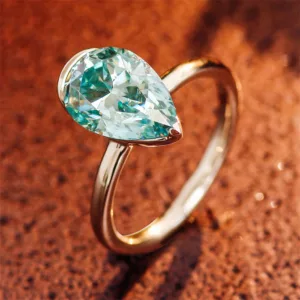 Stunning Pear-Shaped Blue-Green Moissanite Ring - Image 3